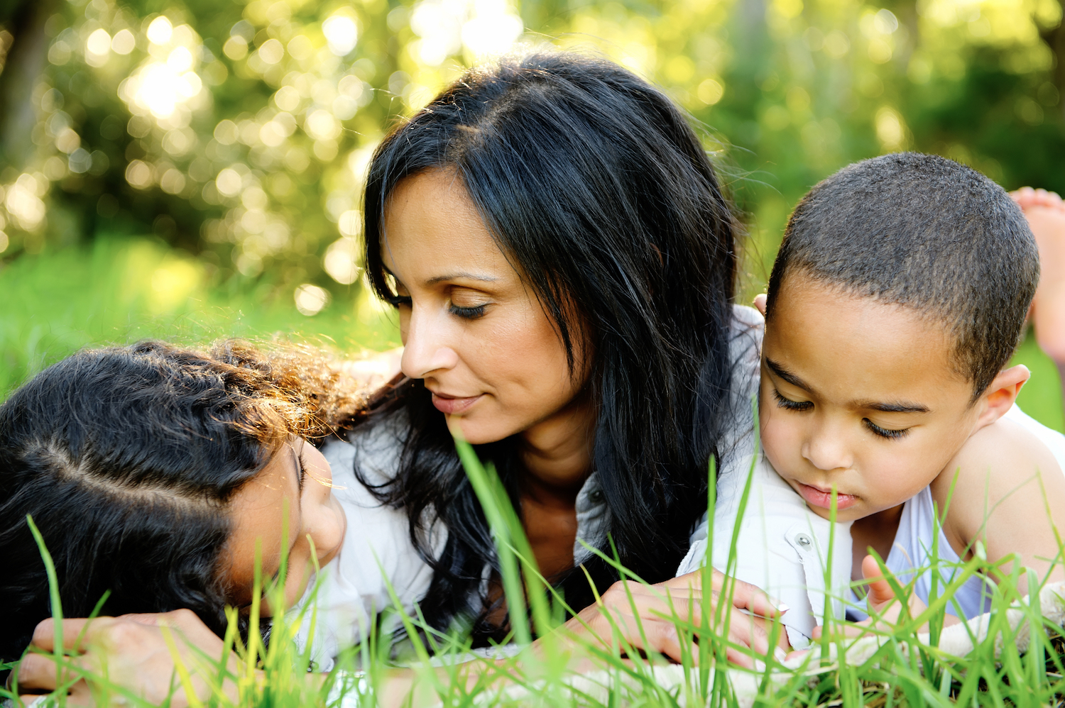 A parent and child working together on a creative project